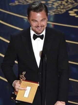 Leonardo Di Caprio vince l'Oscar comne miglior attore in look Armani
